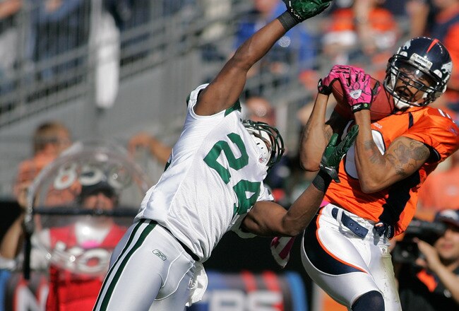 DENVER - OCTOBER 17:  Wide receiver Jabar Gaffney #10 of the Denver Broncos hauls in a reception against cornerback Darrelle Revis #24 of the New York Jets at INVESCO Field at Mile High on October 17, 2010 in Denver, Colorado.  (Photo by Justin Edmonds/Getty Images)