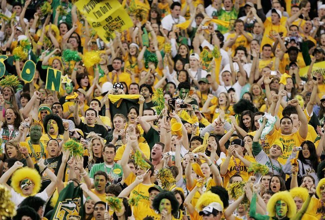 INDIANAPOLIS - APRIL 01:  The George Mason Patriots fans cheer their team on against the Florida Gators during the semifinal game of the NCAA Men's Final Four on April 1, 2006 at the RCA Dome in Indianapolis, Indiana.  (Photo by Andy Lyons/Getty Images)