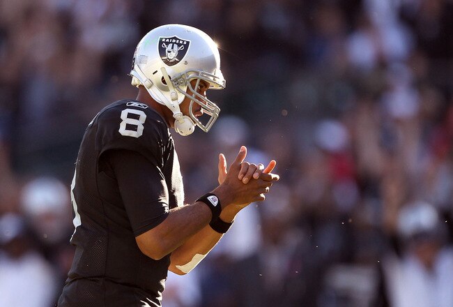 OAKLAND, CA - OCTOBER 31:  Jason Campbell #8 of the Oakland Raiders claps his hands after the Raiders scored their last touchdown against the Seattle Seahawks at Oakland-Alameda County Coliseum on October 31, 2010 in Oakland, California.  (Photo by Ezra Shaw/Getty Images)