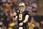 NEW ORLEANS - NOVEMBER 21:  Quarterback Drew Brees #9 of the New Orleans Saints reacts after a first down against the Seattle Seahawks at Louisiana Superdome on November 21, 2010 in New Orleans, Louisiana.  (Photo by Kevin C. Cox/Getty Images)