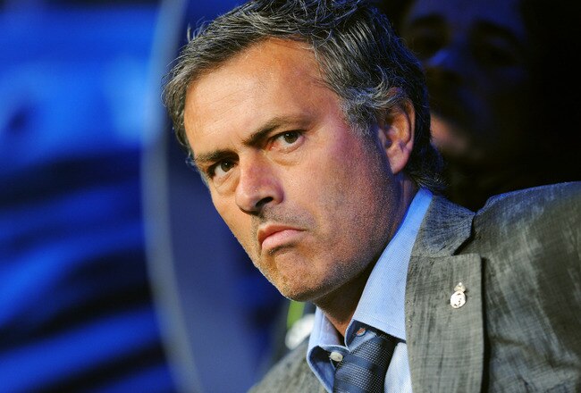 MADRID, SPAIN - OCTOBER 03:  Real Madrid manager Jose Mourinho looks out from the dug-out before the start of the La Liga match between Real Madrid and Deportivo La Coruna  at Estadio Santiago Bernabeu on October 3, 2010 in Madrid, Spain.  (Photo by Denis Doyle/Getty Images)