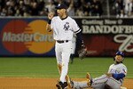 NEW YORK - OCTOBER 20:  Derek Jeter #2 of the New York Yankees reacts after he tagged out Elvis Andrus #1 of the Texas Rangers on a pickoff play at second base in the top of the seventh inninng of Game Five of the ALCS during the 2010 MLB Playoffs at Yankee Stadium on October 20, 2010 in the Bronx borough of New York City.  (Photo by Jim McIsaac/Getty Images)