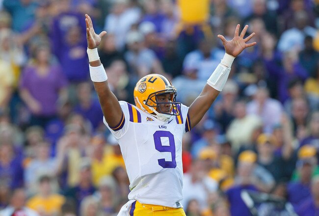 BATON ROUGE, LA - NOVEMBER 20:  Quarterback Jordan Jefferson #9 of the Louisiana State University Tigers reacts after scoring a touchdown against the Ole Miss Rebels at Tiger Stadium on November 20, 2010 in Baton Rouge, Louisiana.  (Photo by Kevin C. Cox/Getty Images)