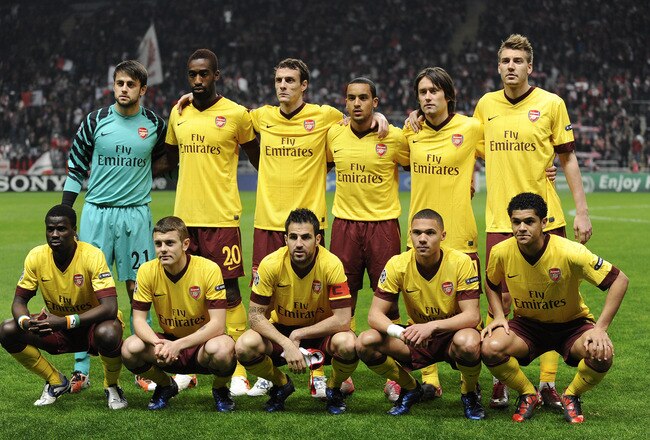 BRAGA, PORTUGAL - NOVEMBER 23:  Players of Arsenal (L to R) Emmanuel Eboue, Lukasz Fabianski,  Johan Djourou, Jack Wilshere, Sebastien Squillaci, Cesc Fabregas, Theo Walcott, Tomas Rosicky, Kieran Gibbs, Nicklas Bendtner and Denilson pose prior their the UEFA Champions League Group H match between SC Braga and Arsenal at Estadio Municipal de Braga on November 23, 2010 in Braga, Portugal.  SC Braga won the match 2-0.  (Photo by David Ramos/Getty Images)