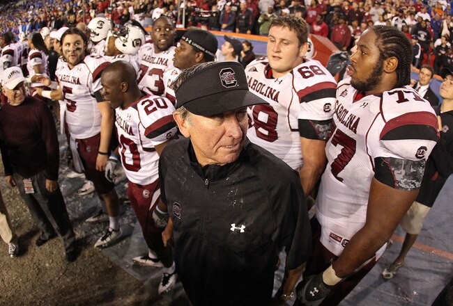 GAINESVILLE, FL - NOVEMBER 13:  South Carolina Gamecocks head coach Steve Spurrier greets his players after winning a game against the Florida Gators at Ben Hill Griffin Stadium on November 13, 2010 in Gainesville, Florida. The Gamecocks beat the Gators 36-14.  (Photo by Mike Ehrmann/Getty Images)