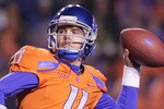 BOISE, ID - NOVEMBER 19:  Kellen Moore #11 of the Boise State Broncos passes against the Fresno State Bulldogs at Bronco Stadium on November 19, 2010 in Boise, Idaho.  (Photo by Otto Kitsinger III/Getty Images)