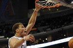 LOS ANGELES, CA - OCTOBER 27:  Blake Griffin #32 of the Los Angeles Clippers dunks during the first half against the Portland Trail Blazers at Staples Center on October 27, 2010 in Los Angeles, California. NOTE TO USER: User expressly acknowledges and agrees that, by downloading and or using this photograph, User is consenting to the terms and conditions of the Getty Images License Agreement.  (Photo by Harry How/Getty Images)