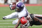 SALT LAKE CITY, UT - NOVEMBER 6: Conroy Black #9 of the Utah Utes tackles Matthew Tucker #29 of the TCU Horned Frogs during the second half of an NCAA Football game November 6, 2010 at Rice-Eccles Stadium in Salt Lake City, Utah. TCU Beat Utah 47-7.  (Photo by George Frey/Getty Images)