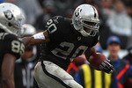 OAKLAND, CA - NOVEMBER 07:  Darren McFadden #20 of the Oakland Raiders runs against Brandon Carr #39 of the Kansas City Chiefs during an NFL game at Oakland-Alameda County Coliseum on November 7, 2010 in Oakland, California.  (Photo by Jed Jacobsohn/Getty Images)