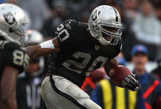 OAKLAND, CA - NOVEMBER 07:  Darren McFadden #20 of the Oakland Raiders runs against Brandon Carr #39 of the Kansas City Chiefs during an NFL game at Oakland-Alameda County Coliseum on November 7, 2010 in Oakland, California.  (Photo by Jed Jacobsohn/Getty Images)