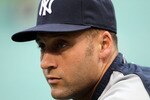 ARLINGTON, TX - OCTOBER 22:  Derek Jeter #2 of the New York Yankees looks on during batting practice against the Texas Rangers in Game Six of the ALCS during the 2010 MLB Playoffs at Rangers Ballpark in Arlington on October 22, 2010 in Arlington, Texas.  (Photo by Stephen Dunn/Getty Images)