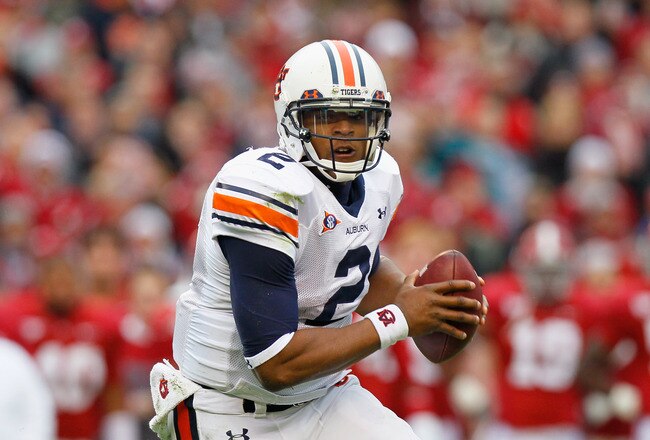 TUSCALOOSA, AL - NOVEMBER 26:  Quarterback Cam Newton #2 of the Auburn Tigers rushes out of the pocket against the Alabama Crimson Tide at Bryant-Denny Stadium on November 26, 2010 in Tuscaloosa, Alabama.  (Photo by Kevin C. Cox/Getty Images)