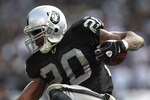 OAKLAND, CA - NOVEMBER 07:  Darren McFadden #20 of the Oakland Raiders runs against the Kansas City Chiefs during an NFL game at Oakland-Alameda County Coliseum on November 7, 2010 in Oakland, California.  (Photo by Jed Jacobsohn/Getty Images)