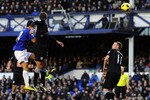 LIVERPOOL, ENGLAND - NOVEMBER 27:  Tim Cahill of Everton scores his side's first goal during the Barclays Premier League match between Everton and West Bromwich Albion at Goodison Park on November 27, 2010 in Liverpool, England.  (Photo by Chris Brunskill/Getty Images)