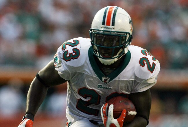 MIAMI - OCTOBER 25:  Running back Ronnie Brown #23 of the Miami Dolphins looks for room to run against the New Orleans Saints at Land Shark Stadium on October 25, 2009 in Miami, Florida.  (Photo by Doug Benc/Getty Images)