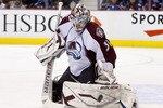 VANCOUVER, CANADA - NOVEMBER 24: Goalie Peter Budaj #31 of the Colorado Avalanche makes a pad save against the Vancouver Canucks during the second period in NHL action on November 24, 2010 at Rogers Arena in Vancouver, British Columbia, Canada.  (Photo by Rich Lam/Getty Images)