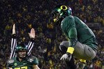 EUGENE, OR - NOVEMBER 26:  LaMichael James #21 of the Oregon Ducks celebrates a touchdown run against the Arizona Wildcats on November 26, 2010 at the Autzen Stadium in Eugene, Oregon.  (Photo by Jonathan Ferrey/Getty Images)