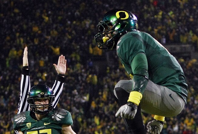 EUGENE, OR - NOVEMBER 26:  LaMichael James #21 of the Oregon Ducks celebrates a touchdown run against the Arizona Wildcats on November 26, 2010 at the Autzen Stadium in Eugene, Oregon.  (Photo by Jonathan Ferrey/Getty Images)