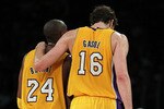 LOS ANGELES, CA - NOVEMBER 02:  Pau Gasol #16 of the Los Angeles Lakers puts his arm around teammate Kobe Bryant #24 during the game against the Memphis Grizzlies at Staples Center on November 2, 2010 in Los Angeles, California. The Lakers defeated the Grizzlies 124-105. NOTE TO USER: User expressly acknowledges and agrees that, by downloading and or using this photograph, User is consenting to the terms and conditions of the Getty Images License Agreement.  (Photo by Jeff Gross/Getty Images)