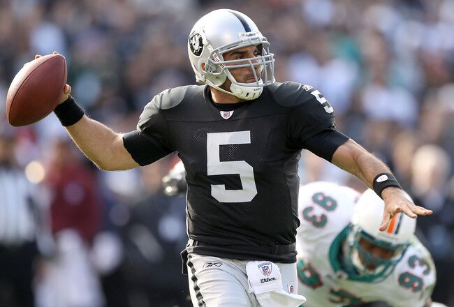 OAKLAND, CA - NOVEMBER 28:  Bruce Gradkowski #5 of the Oakland Raiders passes the ball against the Miami Dolphins at Oakland-Alameda County Coliseum on November 28, 2010 in Oakland, California.  (Photo by Ezra Shaw/Getty Images)