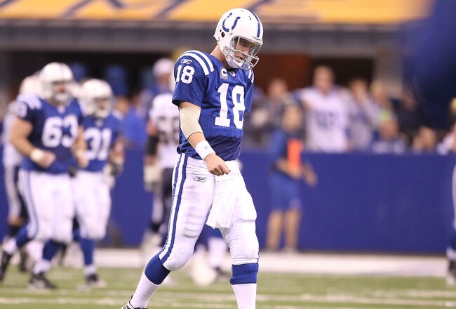INDIANAPOLIS - NOVEMBER 28:  Peyton Manning #18 of the Indianapolis Colts walks off of the field after throwing an interception that was returned for a touchdown during the NFL game against the San Diego Chargers at Lucas Oil Stadium on November 28, 2010 in Indianapolis, Indiana.  The Chargers won 36-14.(Photo by Andy Lyons/Getty Images)
