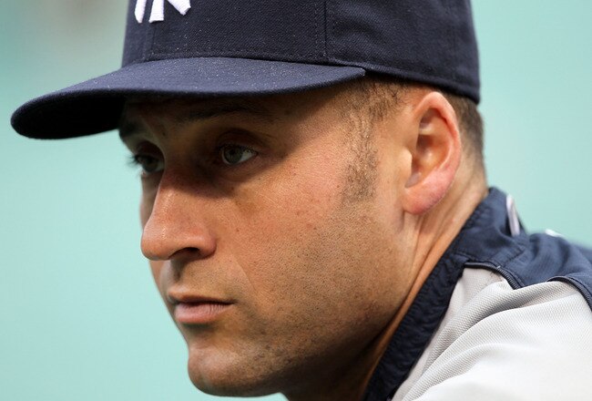 ARLINGTON, TX - OCTOBER 22:  Derek Jeter #2 of the New York Yankees looks on during batting practice against the Texas Rangers in Game Six of the ALCS during the 2010 MLB Playoffs at Rangers Ballpark in Arlington on October 22, 2010 in Arlington, Texas.  (Photo by Stephen Dunn/Getty Images)