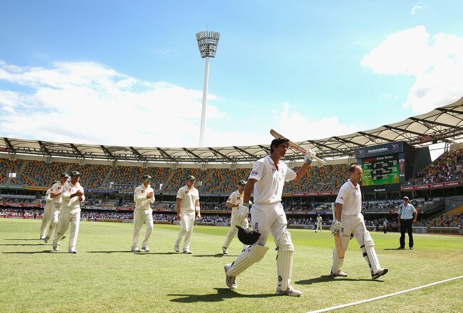 BRISBANE, AUSTRALIA - NOVEMBER 29:  Alastair Cook and Jonathan Trott of England leave the ground after England declared their second innings during day five of the First Ashes Test match between Australia and England at The Gabba on November 29, 2010 in Brisbane, Australia.  (Photo by Ryan Pierse/Getty Images)