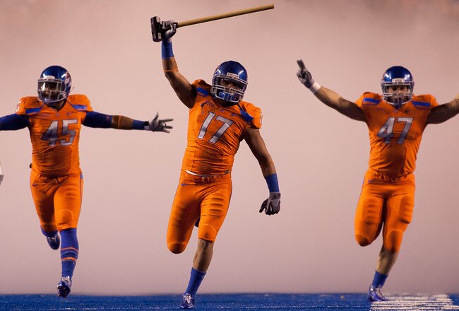 BOISE, ID - NOVEMBER 19:  Winston Venable #17 leads the Boise State Broncos onto the field before their game against the Fresno State Bulldogs at Bronco Stadium on November 19, 2010 in Boise, Idaho.  (Photo by Otto Kitsinger III/Getty Images)