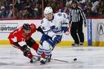 OTTAWA, ON - NOVEMBER 27:  Nick Foligno #71 of the Ottawa Senators pokes the puck away from Tyler Bozak #42 of the Toronto Maple Leafs in a game at Scotiabank Place on November 27, 2010 in Ottawa, Ontario, Canada.  (Photo by Phillip MacCallum/Getty Images)