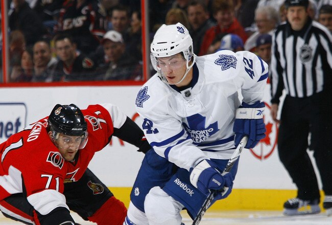 OTTAWA, ON - NOVEMBER 27:  Nick Foligno #71 of the Ottawa Senators pokes the puck away from Tyler Bozak #42 of the Toronto Maple Leafs in a game at Scotiabank Place on November 27, 2010 in Ottawa, Ontario, Canada.  (Photo by Phillip MacCallum/Getty Images)