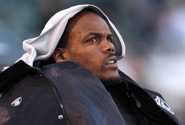 OAKLAND, CA - NOVEMBER 28:  Rock Cartwright #25 of the Oakland Raiders sits on the bench during the closing minutes of their loss to the Miami Dolphins at Oakland-Alameda County Coliseum on November 28, 2010 in Oakland, California.  (Photo by Ezra Shaw/Getty Images)