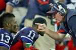 TORONTO, ON - NOVEMBER 07:  Chan Gailey, head coach of the Buffalo Bills talks to Steve Johnson #13  on the sidelines against the Chicago Bears at Rogers Centre on November 7, 2010 in Toronto, Canada. Chicago won 22-19.  (Photo by Rick Stewart/Getty Images)