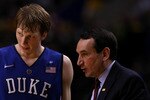 PORTLAND, OR - NOVEMBER 27:  Head Coach Mike Krzyzewski of the Duke Blue Devils talks Kyle Singler #12 against the Oregon Ducks on November 27, 2010 at the Rose Garden in Portland, Oregon.  (Photo by Jonathan Ferrey/Getty Images)