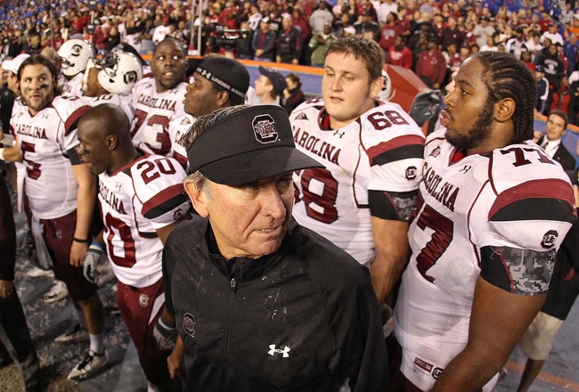 GAINESVILLE, FL - NOVEMBER 13:  South Carolina Gamecocks head coach Steve Spurrier greets his players after winning a game against the Florida Gators at Ben Hill Griffin Stadium on November 13, 2010 in Gainesville, Florida. The Gamecocks beat the Gators 36-14.  (Photo by Mike Ehrmann/Getty Images)