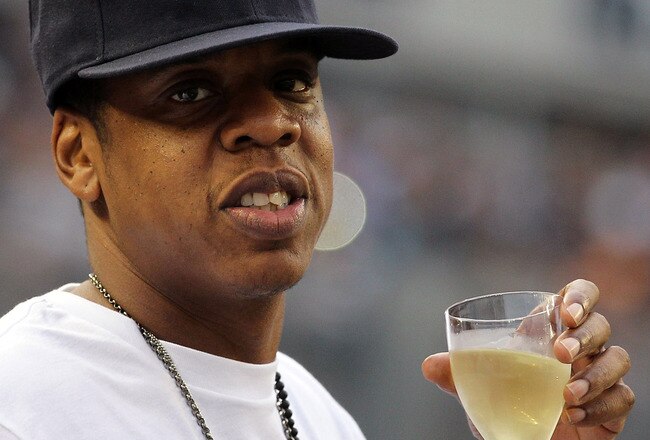 NEW YORK - JULY 23:  Rapper Jay-Z watches the game between the New York Yankees and the Kansas City Royals on July 23, 2010 at Yankee Stadium in the Bronx borough of New York City.  (Photo by Al Bello/Getty Images)