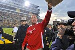 IOWA CITY, IA - OCTOBER 23: Wisconsin Badgers head coach Bret Bielema waves to fans after after his victory over the University of Iowa Hawkeyes at Kinnick Stadium on October 23, 2010 in Iowa City, Iowa. Wisconsin won 31-30 over Iowa. (Photo by David Purdy/Getty Images).
