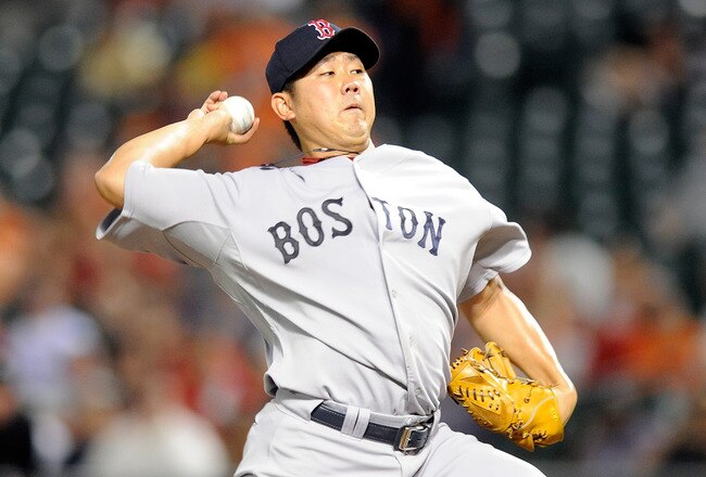 BALTIMORE - SEPTEMBER 02:  Daisuke Matsuzaka #18 of the Boston Red Sox pitches against the Baltimore Orioles at Camden Yards on September 2, 2010 in Baltimore, Maryland.  (Photo by Greg Fiume/Getty Images)