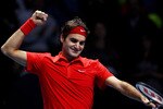 LONDON, ENGLAND - NOVEMBER 28:  Roger Federer of Switzerland celebrates victory after his men's final match against Rafael Nadal of Spain during the ATP World Tour Finals at O2 Arena on November 28, 2010 in London, England.  (Photo by Julian Finney/Getty Images)