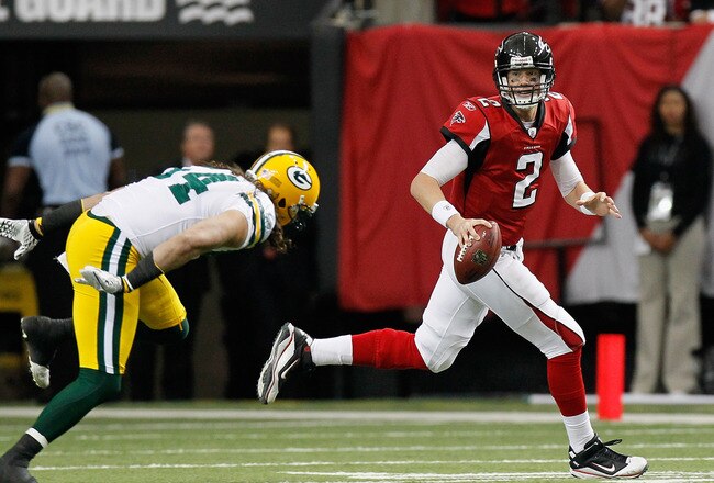 ATLANTA - NOVEMBER 28:  Quarterback Matt Ryan #2 of the Atlanta Falcons rushes out of the pocket away from Brandon Chillar #54 of the Green Bay Packers at Georgia Dome on November 28, 2010 in Atlanta, Georgia.  (Photo by Kevin C. Cox/Getty Images)