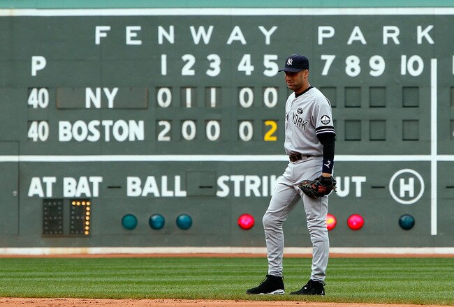 BOSTON - OCTOBER 3:  Derek Jeter #2 of the New York Yankees moves the the right side of the infield in preparation for batter David Ortiz #34 of the Boston Red Sox  during a game at Fenway Park, October 3, 2010, in Boston, Massachusetts. (Photo by Jim Rogash/Getty Images)