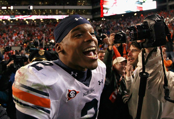 TUSCALOOSA, AL - NOVEMBER 26:  Quarterback Cam Newton #2 of the Auburn Tigers celebrates their 28-27 win over the Alabama Crimson Tide at Bryant-Denny Stadium on November 26, 2010 in Tuscaloosa, Alabama.  (Photo by Kevin C. Cox/Getty Images)