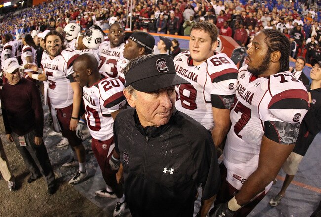 GAINESVILLE, FL - NOVEMBER 13:  South Carolina Gamecocks head coach Steve Spurrier greets his players after winning a game against the Florida Gators at Ben Hill Griffin Stadium on November 13, 2010 in Gainesville, Florida. The Gamecocks beat the Gators 36-14.  (Photo by Mike Ehrmann/Getty Images)