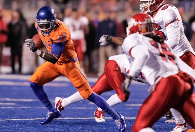 BOISE, ID - NOVEMBER 19:  Jeremy Avery #27 of the Boise State Broncos runs the ball against the Fresno State Bulldogs at Bronco Stadium on November 19, 2010 in Boise, Idaho.  (Photo by Otto Kitsinger III/Getty Images)