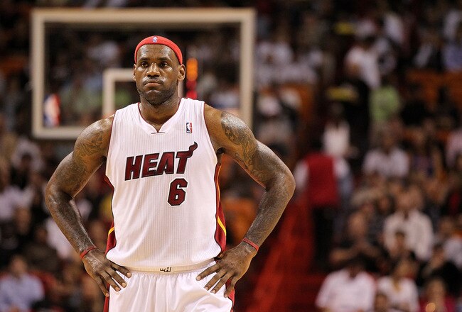 MIAMI, FL - DECEMBER 01:  LeBron James #6 of the Miami Heat looks on during a game against the Detroit Pistons at American Airlines Arena on December 1, 2010 in Miami, Florida. NOTE TO USER: User expressly acknowledges and agrees that, by downloading and/or using this Photograph, User is consenting to the terms and conditions of the Getty Images License Agreement.  (Photo by Mike Ehrmann/Getty Images)