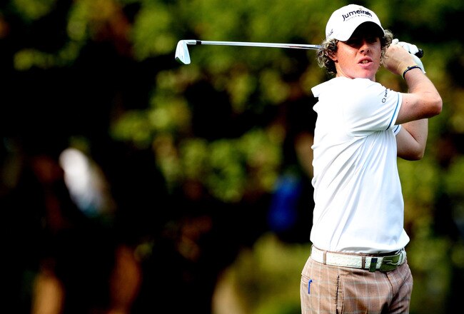 HONG KONG - NOVEMBER 21: Rory Mcilroy of Northern Ireland watches his 2nd shot on the 13th hole during day four of the UBS Hong Kong Open at The Hong Kong Golf Club on November 21, 2010 in Hong Kong, Hong Kong.  (Photo by Stanley Chou/Getty Images)