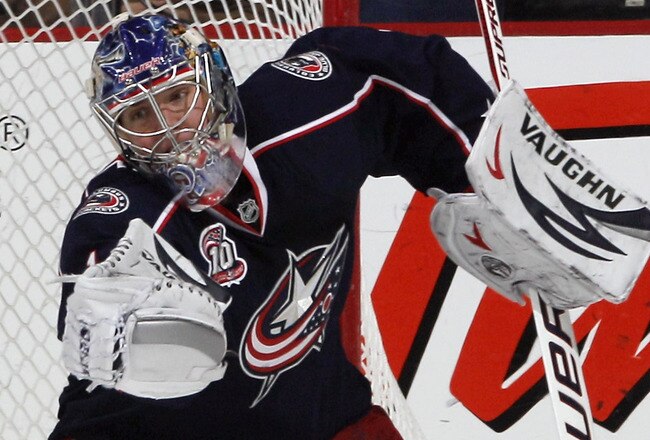 COLUMBUS, OH - DECEMBER 01: Steve Mason #1 of the Columbus Blue Jackets comes up with the puck during second period action against the Phoenix Coyotes at the Nationwide Arena on December 1, 2010 in Columbus, Ohio. The Predators defeated the Blue Jackets 4-3 in the shootout. (Photo by Bruce Bennett/Getty Images)