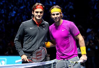 LONDON, ENGLAND - NOVEMBER 28: Roger Federer of Switzerland (L) and Rafael Nadal of Spain (R) pose on court before their men's final during the ATP World Tour Finals at O2 Arena on November 28, 2010 in London, England. (Photo by Julian Finney/Getty Images)