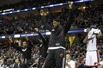 CLEVELAND, OH - DECEMBER 02:  LeBron James #6 of the Miami Heat reacts while playing the Cleveland Cavaliers at Quicken Loans Arena on December 2, 2010 in Cleveland, Ohio. NOTE TO USER: User expressly acknowledges and agrees that, by downloading and or using this photograph, User is consenting to the terms and conditions of the Getty Images License Agreement.  (Photo by Gregory Shamus/Getty Images)