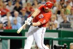 WASHINGTON - SEPTEMBER 24:  Adam Dunn #44 of the Washington Nationals hits a home run in the second inning against the Atlanta Braves at Nationals Park on September 24, 2010 in Washington, DC.  (Photo by Greg Fiume/Getty Images)