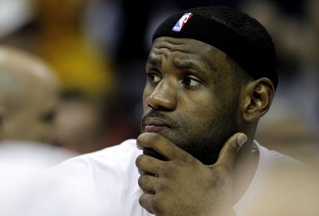 CLEVELAND, OH - DECEMBER 02:  LeBron James #6 of the Miami Heat looks on while playing the Cleveland Cavaliers at Quicken Loans Arena on December 2, 2010 in Cleveland, Ohio. NOTE TO USER: User expressly acknowledges and agrees that, by downloading and or using this photograph, User is consenting to the terms and conditions of the Getty Images License Agreement.  (Photo by Gregory Shamus/Getty Images)